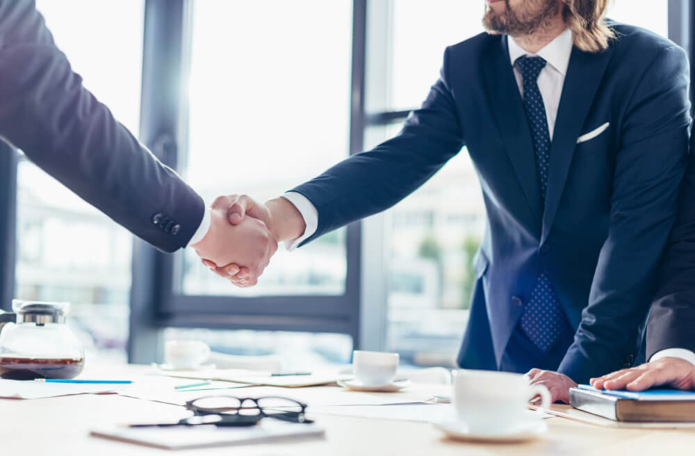 img-man-shaking-hands Shaking hands